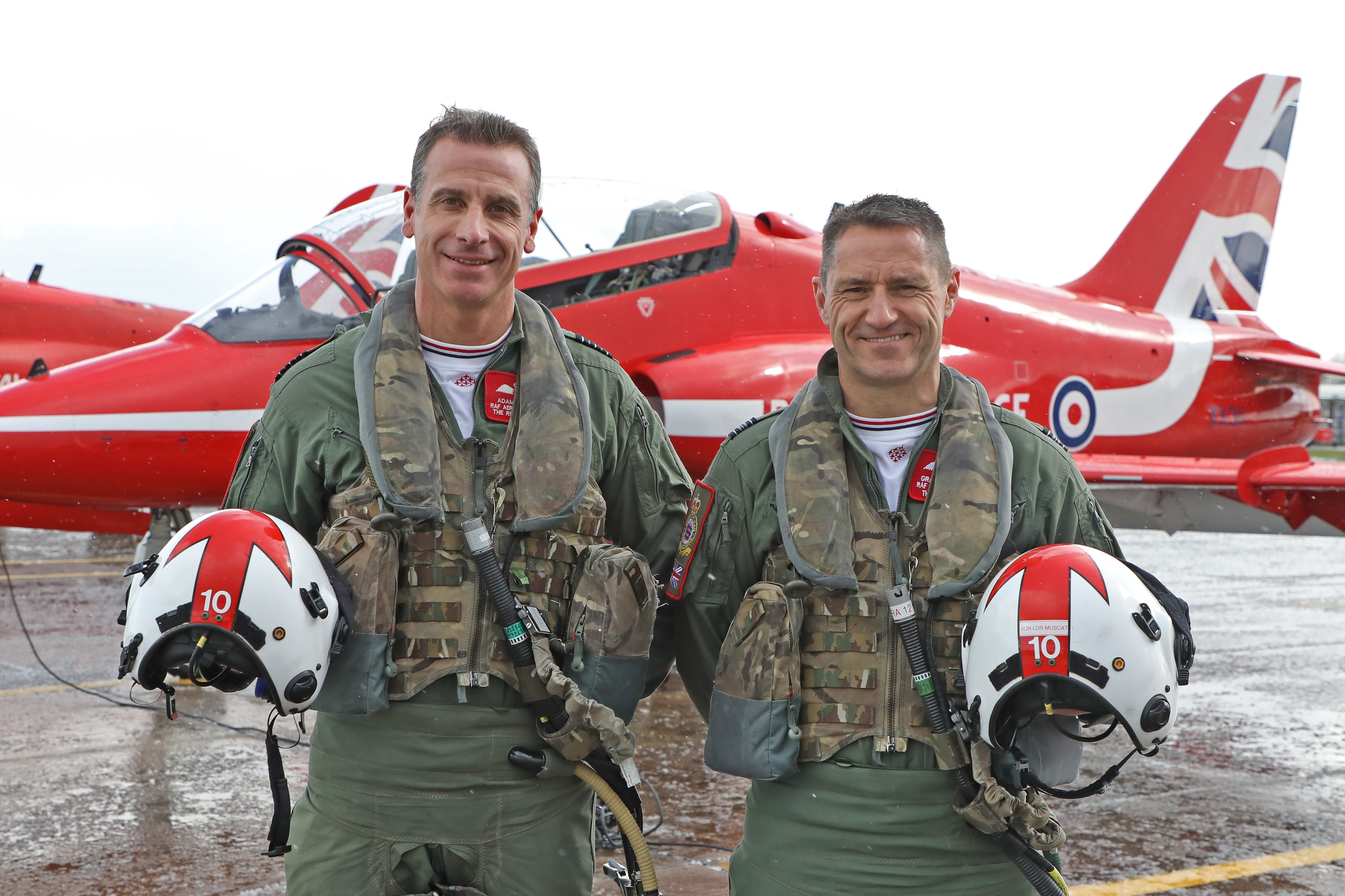 Wg Cdr Adam Collins, left, handing over to new Red 10 - Sqn Ldr Graeme Muscat, right.